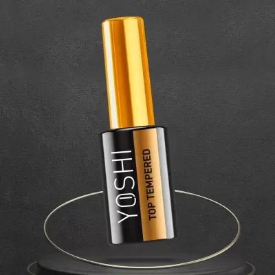 Frasco de verniz de unhas YOSHI com tampa dourada e etiqueta preta e dourada