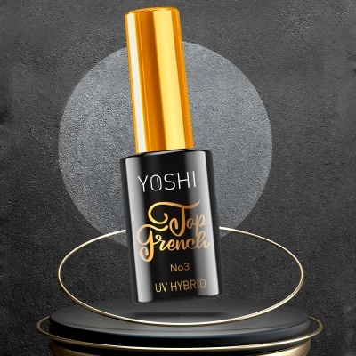 Frasco de esmalte em gel UV híbrido YOSHI Top French No3 preto e dourado sobre plataforma preta e fundo cinzento