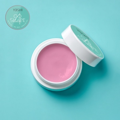 Pote branco aberto com creme rosa e tampa com etiqueta verde