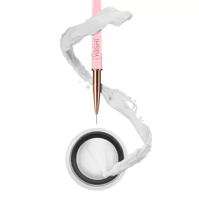 Pincel rosa com líquido branco em movimento ao redor