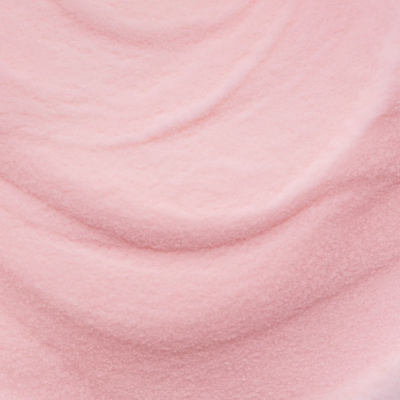Tecido rosa claro felpudo com textura suave e ondulações