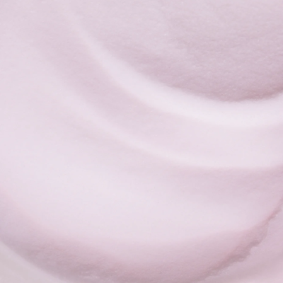 Superfície cremosa rosa claro com textura ondulada