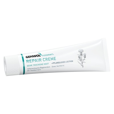 Tubo branco de creme para pele muito seca com texto em alemão e desenho de planta.