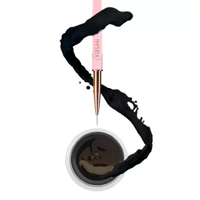 Pincel com tinta preta fluida e recipiente aberto com tinta preta