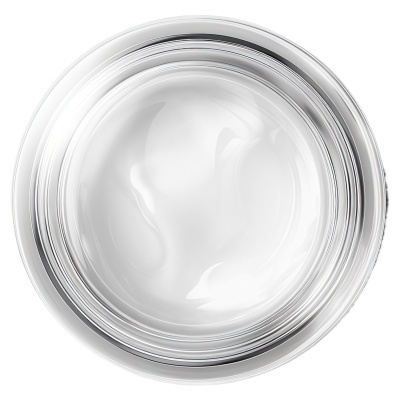 Recipiente prateado com creme branco no interior visto de cima