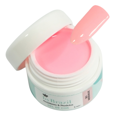 Gel cor-de-rosa para unhas em pote branco e azul claro com tampa aberta e unha postiça cor-de-rosa