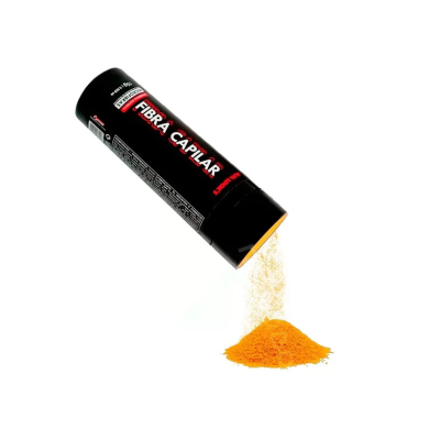 Frasco preto de fibra capilar derramando pó laranja