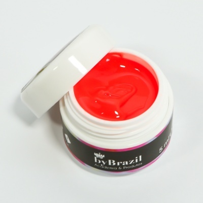 Frasco pequeno aberto com gel vermelho da marca DyBrazil
