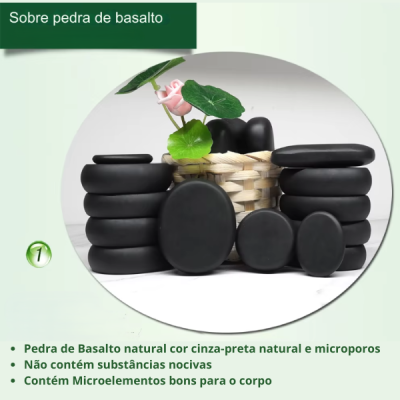 Conjunto de pedras de basalto empilhadas com planta em cesto de vime