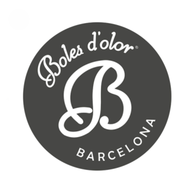 Logótipo circular cinza com texto branco 'Boles d'olor BARCELONA'