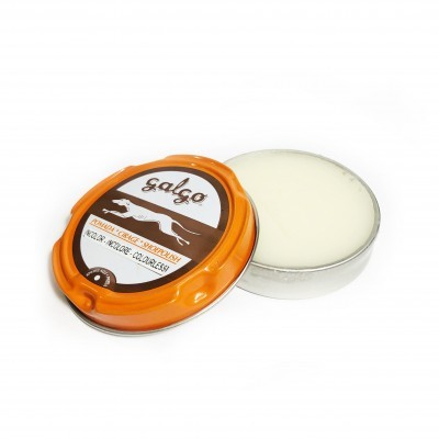 Embalagem metálica redonda com tampa laranja e rótulo, contendo champô sólido branco-amarelado