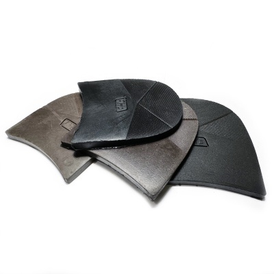 Solas de sapatos em diferentes cores e texturas