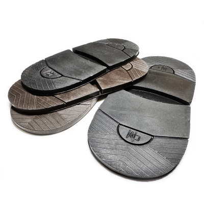 Solas de sapato em borracha preto, cinzento e castanho com logotipo HB