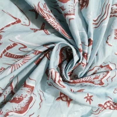 Tejido voile AZUL CLARO ESTAMPADO ISLAS