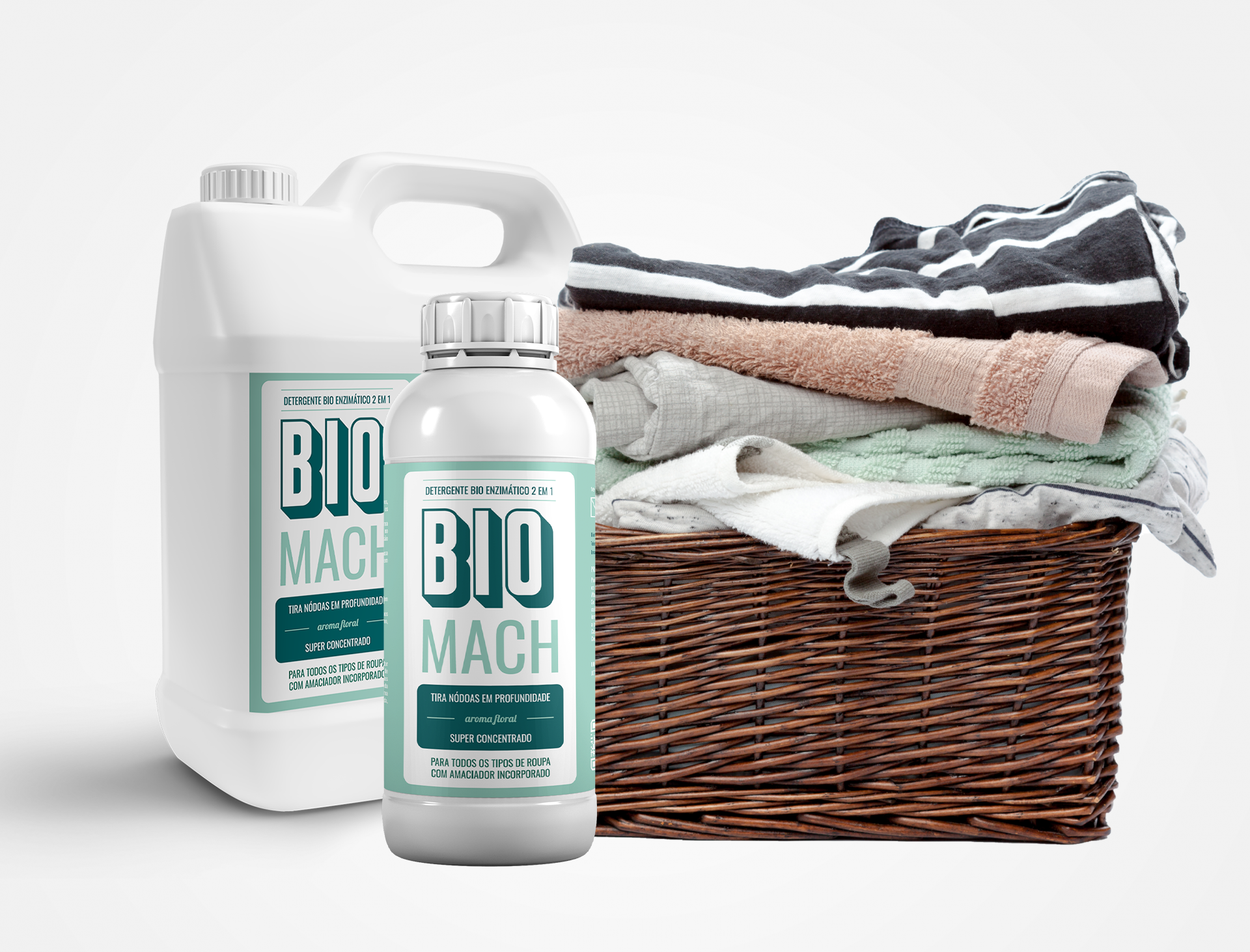 Detergente de roupa bio enzimático 2 em 1 - BIOMACH SUPER Original (frutado) Dois frascos de detergente BIO MACH ao lado de uma cesta de vime com toalhas dobradas