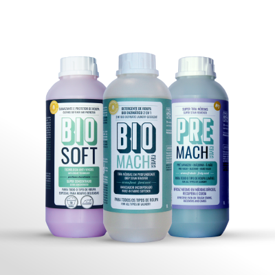 Três frascos plásticos de produtos para roupa, BIO SOFT, BIO MACH e PRE MACH, com rótulos em português e espanhol.