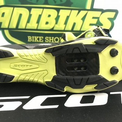 Sola de sapatilha de ciclismo amarelo fluorescente e preto com marca SCOTT