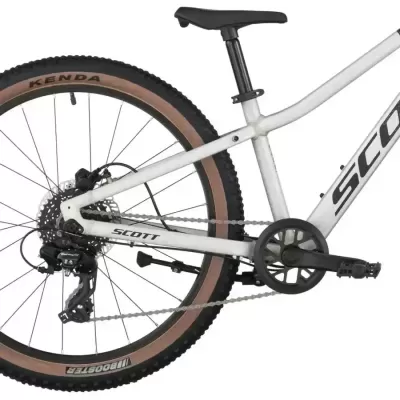 Bicicleta branca com roda traseira KENDA e BOOSTER, quadro SCOTT e selim preto