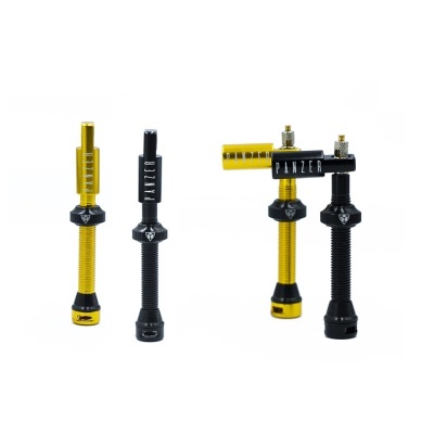 Conjunto de peças metálicas amarelo e preto com texto PANZER