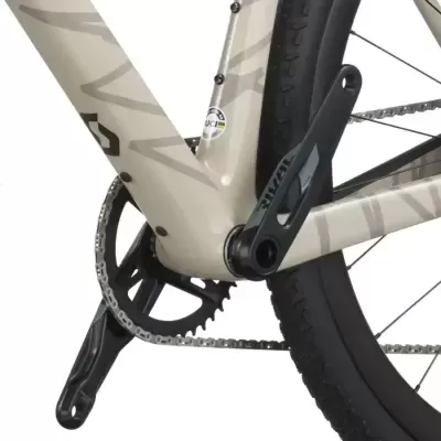 Pedaleira e quadro de bicicleta bege com detalhes cinzentos