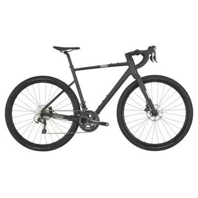 Bicicleta de estrada preta com quadro de carbono e travões de disco