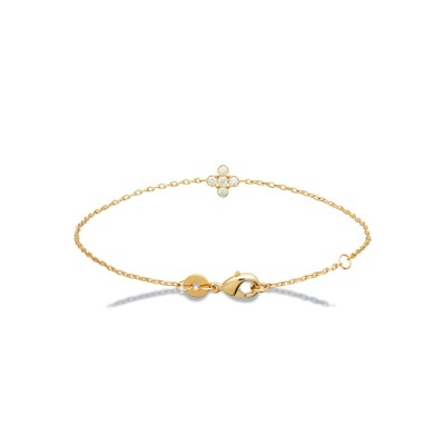Pulseira dourada com cruz de pedras brilhantes