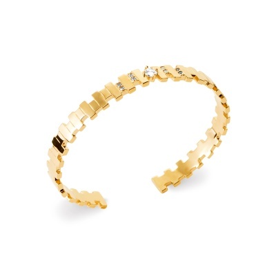 Pulseira aberta dourada com pedras brilhantes em metal