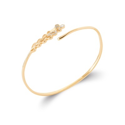 Pulseira dourada aberta com design de folhas e cristais
