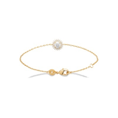 Pulseira fina dourada com pendente redondo de pedra clara