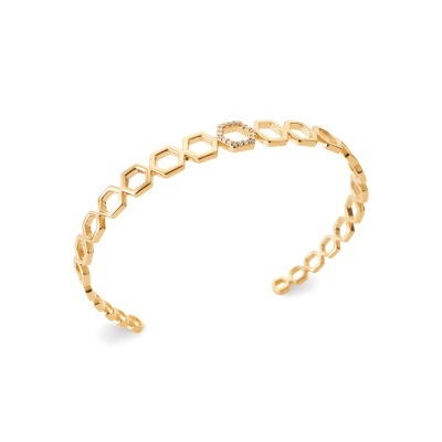 Pulseira dourada com elos hexagonais e cristais