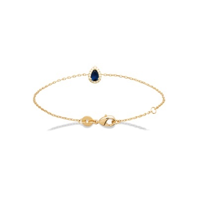 Pulseira fina dourada com pendente em gota azul e pequenos cristais