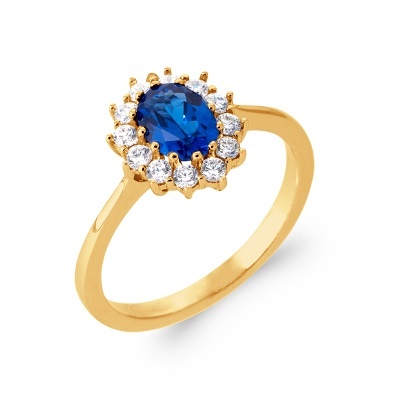 Anel dourado com pedra azul oval e pedras brancas redondas ao redor