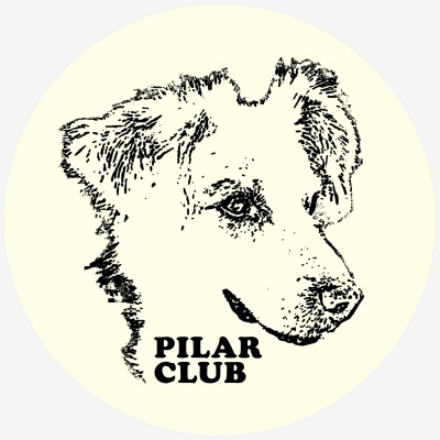 Ilustração em preto e branco da cabeça de um cão com texto PILAR CLUB numa imagem circular.