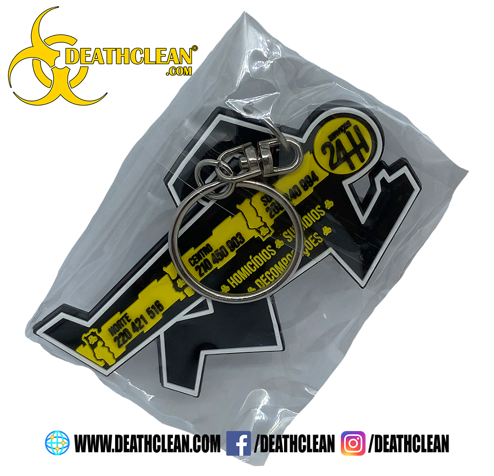 Porta-chaves em PVC transparente preto e amarelo numa embalagem transparente com logótipo DEATHCLEAN.COM