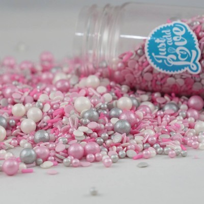 Frasco de confeitos de açúcar rosa, branco e prateado com etiqueta azul 'Just add Love'