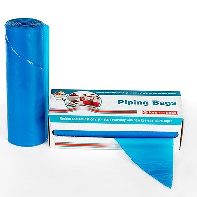 Rolo de sacos azuis para confeitaria e caixa branca com texto