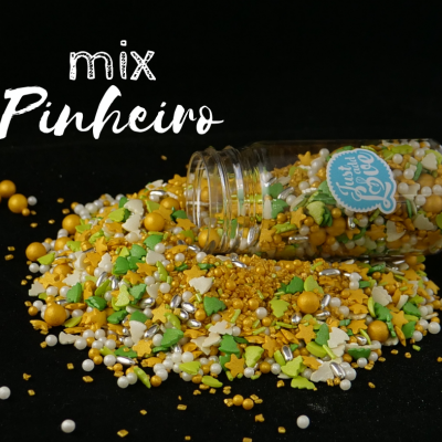 Frasco de vidro com confeitos coloridos para decoração de bolos derramados