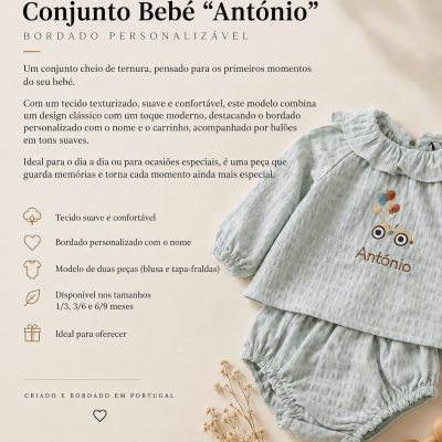 Conjunto bebé verde texturizado com bordado do nome António e carrinho com balões, em fundo claro com flores e esfera de madeira