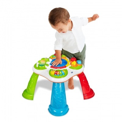 Brinquedo de mesa infantil colorido com pernas e elementos interativos