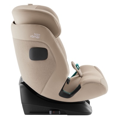 Cadeira auto bege Britax Römer com base preta e detalhes verdes