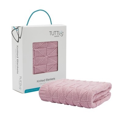 Manta de malha rosa embalada numa caixa branca TUTTI bambini