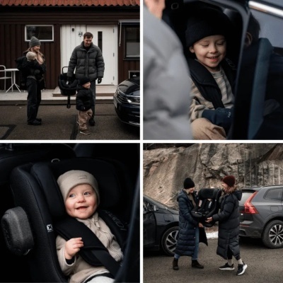 Cadeira auto para bebé preta com cintos acolchoados em uso