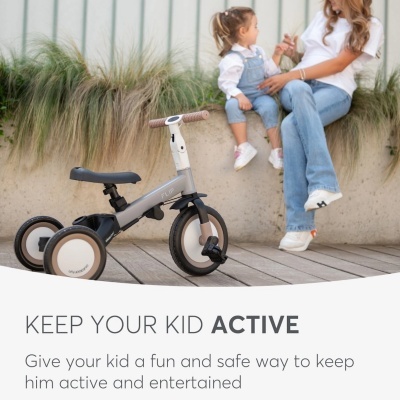 Bicicleta para crianças cinza claro com três rodas e texto promocional