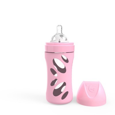 Biberão rosa com manchas cinza e branco, tampa ao lado
