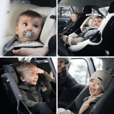 Crianças em assentos auto para crianças dentro de um carro