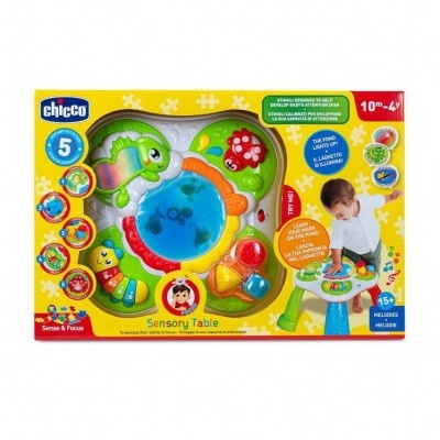 Embalagem de mesa sensorial para crianças da marca Chicco em amarelo e vermelho com peças coloridas.