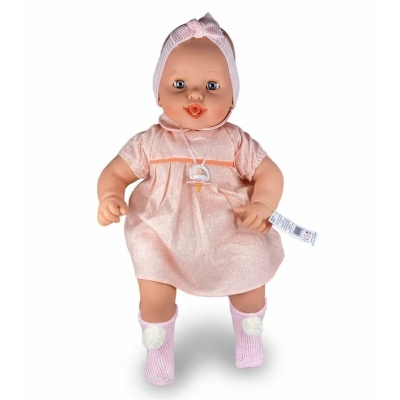 Boneca bebé com vestido cor-de-rosa e faixa na cabeça