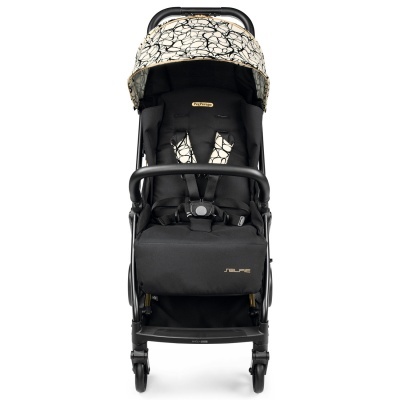 Carrinho de bebé preto com padrão preto e branco no toldo