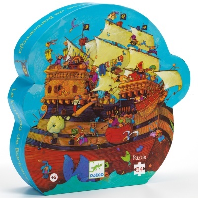 Embalagem de puzzle em formato irregular com ilustração colorida de navio pirata e texto Le bata de Barberoja
