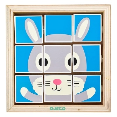 Quebra-cabeças de madeira com imagem de coelho cinzento e azul.